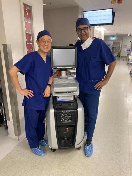 Dr Raji Kooner and a colleague beside the NanoKnife system