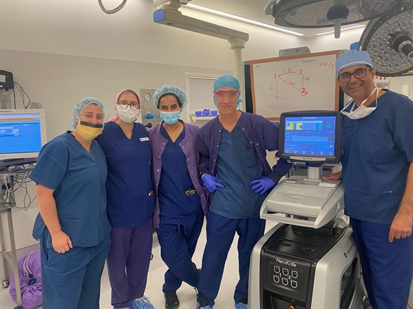 NanoKnife operating team beside the pulse generator