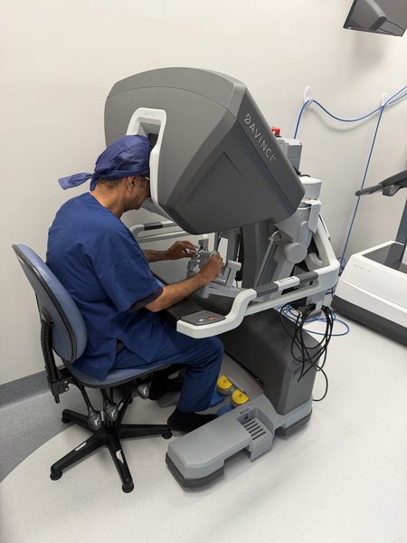 Dr Raji Kooner operating at the robotic console